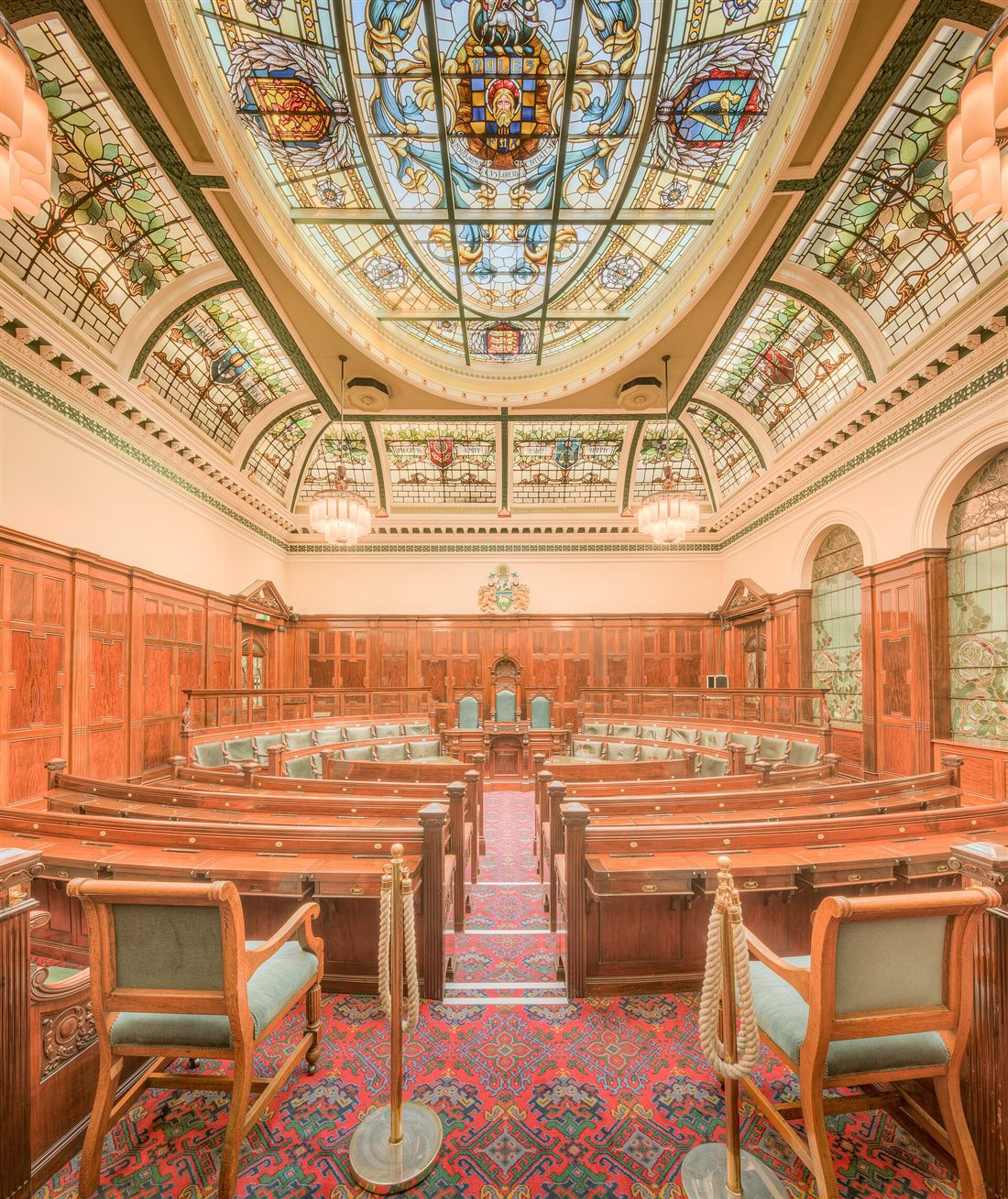 An ornate council chambers meeting room